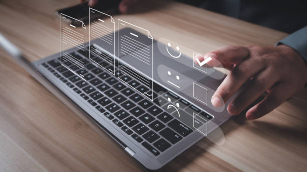 istock Business performance checklist, businessman using laptop doing online checklist survey, filling out digital form checklist, take an assessment, questionnaire, evaluation, online survey, online exam. 2158436874