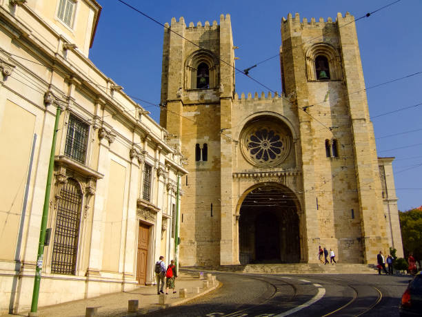 istock Yellow Lisbon tram in front of the cathedral. 2158438084