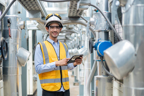 istock Electrical Engineer Monitoring Systems on Laptop 2158438474