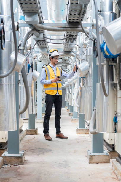 istock Electrical Engineer Monitoring Systems on Laptop 2158438482