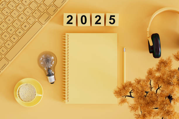 istock 2025 new year, lightbulb and blank page notebook on yellow background, new idea concept. 2158438721