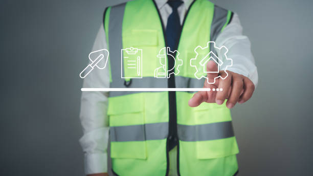 istock Architect or engineer Pointing finger at construction related icons, Project presentation plan, Construction cost planning, Cost calculation, construction planning, Structural calculation. 2158439102