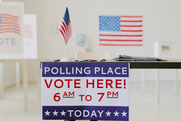 istock Voting Time Sign at Polling Station 2158441846