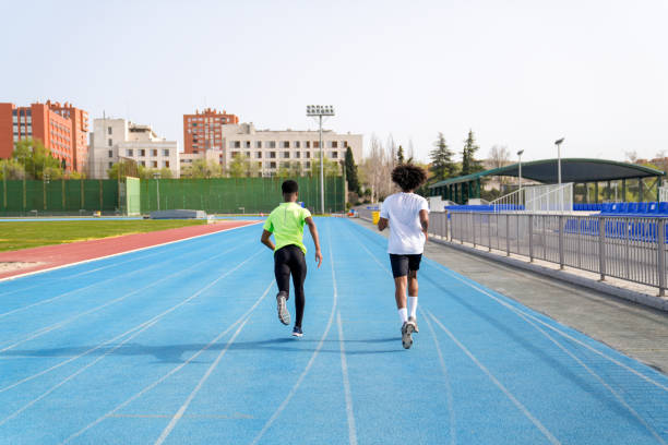 istock Twoafrican men running on a track 2158442781
