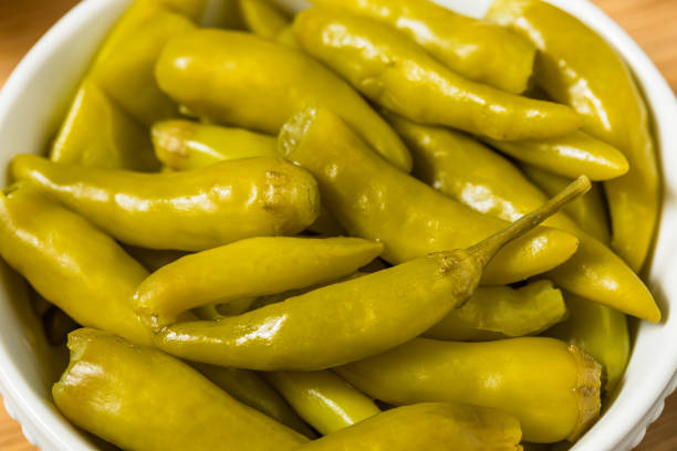 Fresh pickled peppers in a jar