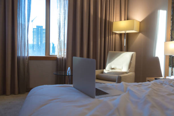 istock A laptop on the bed in modern hotel room 2158451783