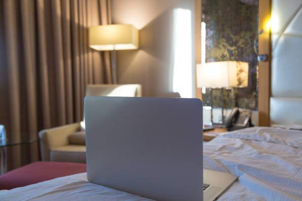 istock A laptop on the bed in modern hotel room 2158451788