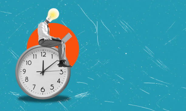 istock Artistic, modern collage picture of a huge clock and a seated man with a light bulb instead of a head, working at a laptop. 2158453672
