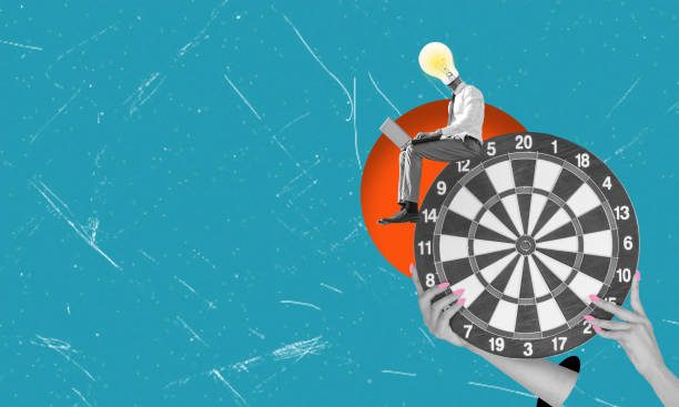 istock Online education, remote work. Young man manager or clerk with laptop sitting on target. Contemporary art collage. Inspiration, idea, fashion. 2158453713