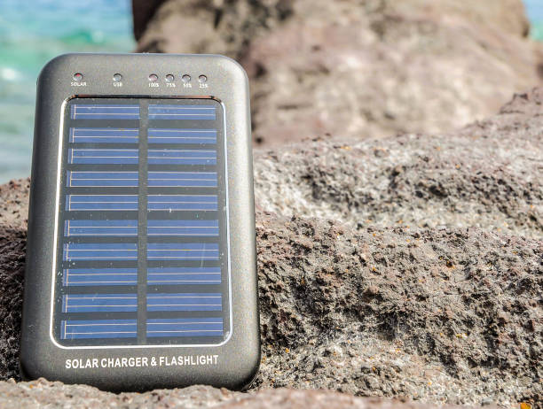 istock A solar charger and flashlight sits on a rock 2158454023