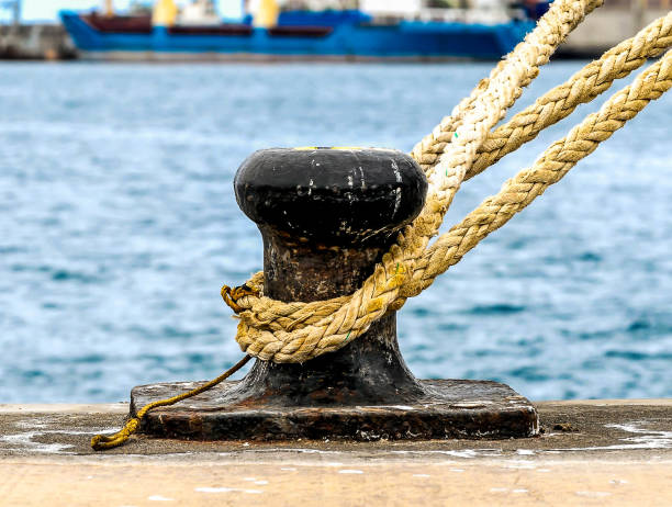 istock A black anchor is tied to a rope 2158454053