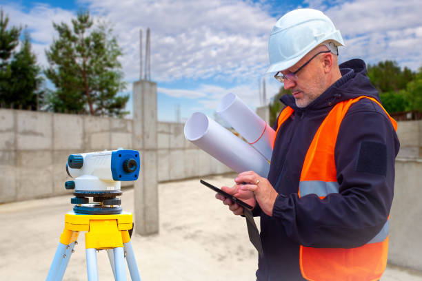 istock Concrete construction site. Building under construction with puddles. Concrete space with supports in center. Concept of preparing foundation for construction. Basement preparation for erection 2158455562