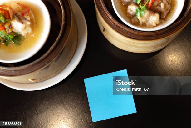 Dim Sum Sticky Notes A Blank Blue Sticky Note Placed On The Dining Table Delicious Dim Sum ...