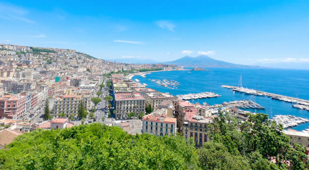 istock Panoramic view of Naples and Mount Vesuvius under a blue sky 2158468035