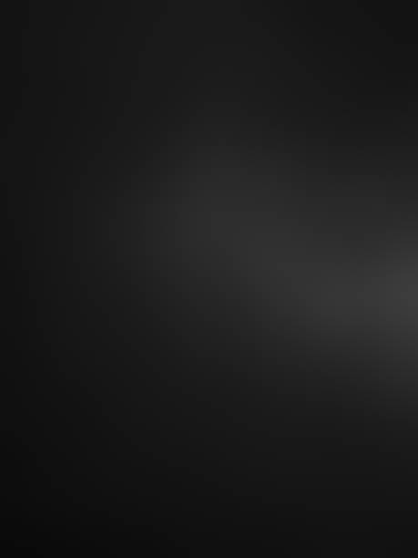 istock A black background with a white background,abstract black background with some smooth lines.black background vector illustration texture and dark gray charcoal paint, dark and gray abstract wallpaper. 2158473649