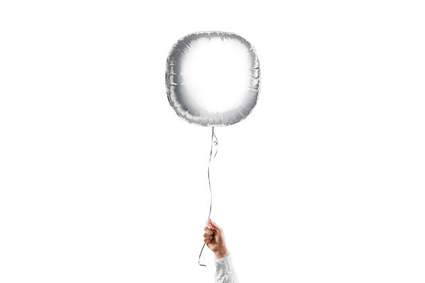 istock Hand holding blank silver round balloon mockup, isolated 2158478153