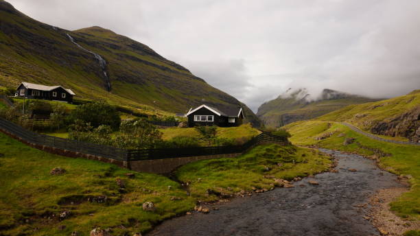 istock Typical old houses in Faroe Islands with a grass rooftop in magical landscape 2158482002