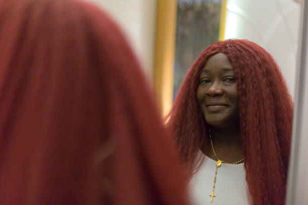 istock Looking at myself in front of the mirror 2158482422