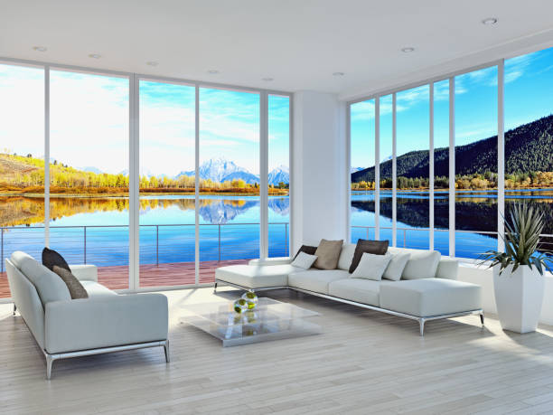 Cozy living room in modern house overlooking sea. 3D generated image.