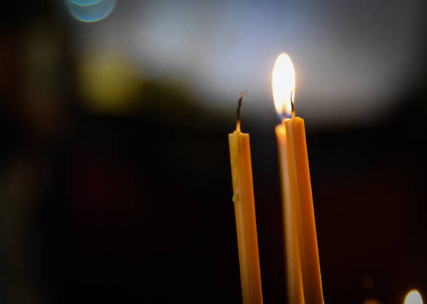istock A paraffin candle burns in the church 2158483517