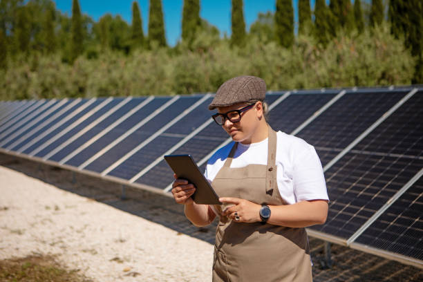 istock Female Farmer at a rural Solar Panel site in Italy 2158484322