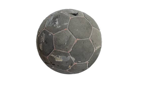 istock A worn black and red soccer ball on a white background 2158484374