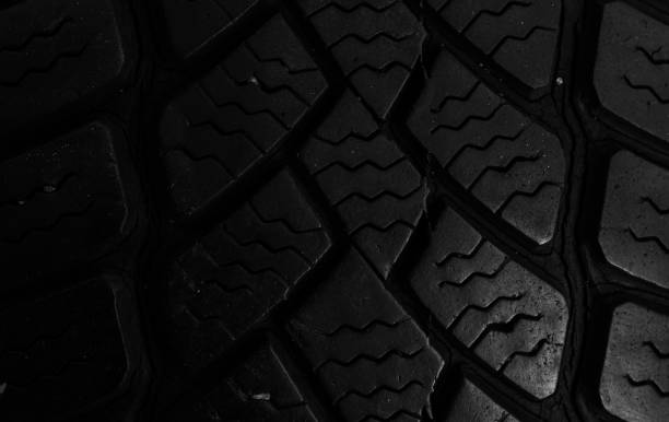 istock tire tread, tire traces background 2158485218