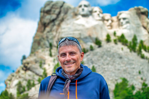 istock A happy man visiting Mt Rushmore, South Dakota 2158491699