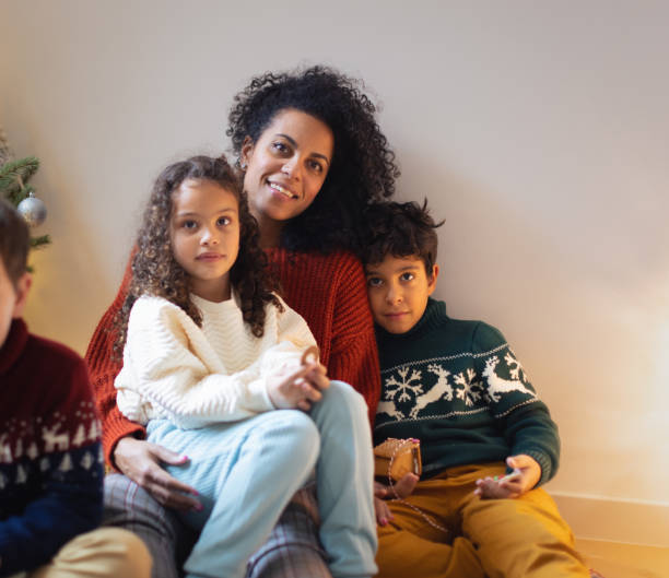 istock Family Celebrating Christmas at Home 2158496401