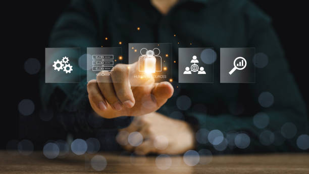 istock HR or HRM management. Human resources,Recruitment Team, Staff management and Relationship, Teamwork, Businessman hold Human Resources on global structure network and Management recruitment employment. 2158501253