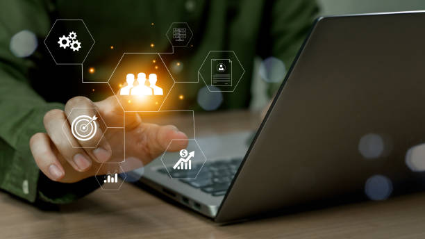 istock HR or HRM management. Human resources,Recruitment Team, Staff management and Relationship, Teamwork, Businessman hold Human Resources on global structure network and Management recruitment employment. 2158501254