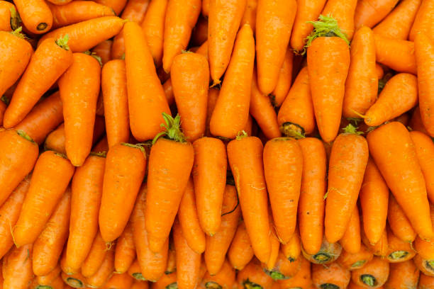 Greengrocer's shelf with organized vegetables and fruits