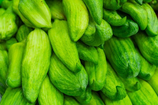 Greengrocer's shelf with organized vegetables and fruits