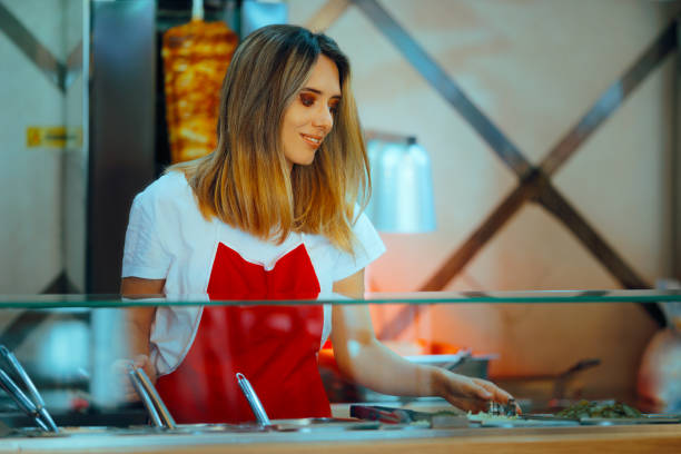 istock Fast Food Chef Making a Dish with precut Ingredients 2158507481