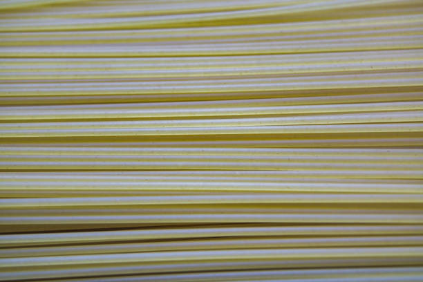 Raw spaghetti close-up macro background.