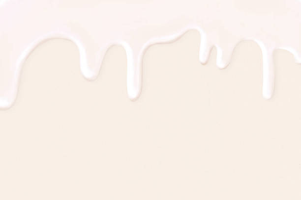 istock Melting white chocolate background, beige border 2158509926