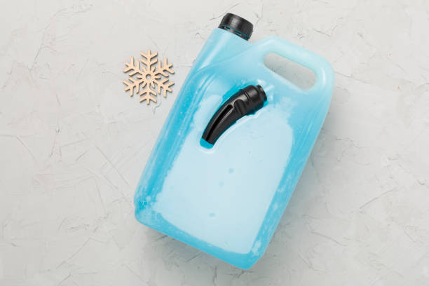 istock Can with antifreeze on concrete background, top view 2158510155