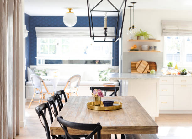 istock Golden kitchen tray on a wooden dining table 2158510245