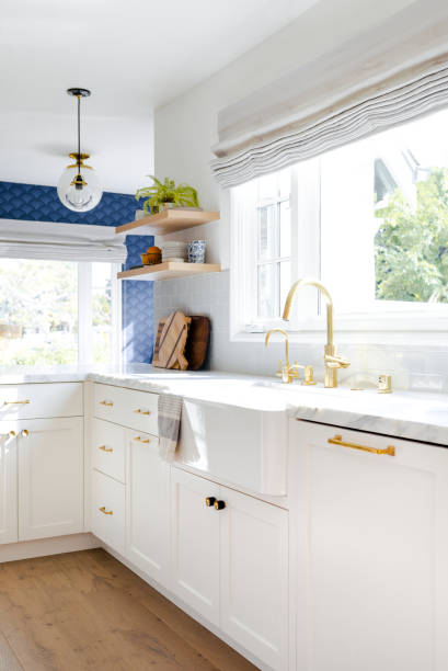 istock Golden kitchen faucet interior design 2158510257