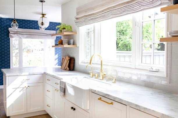 istock Golden kitchen faucet interior design 2158510302