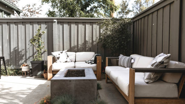 istock Outdoor wooden couch with a fireplace 2158510583