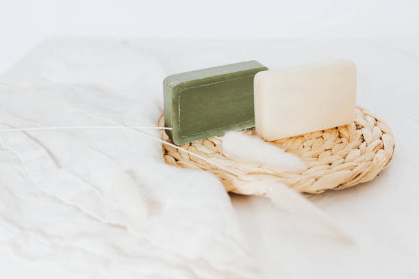 istock Organic soap bars with grass flowers in spa setting 2158512570
