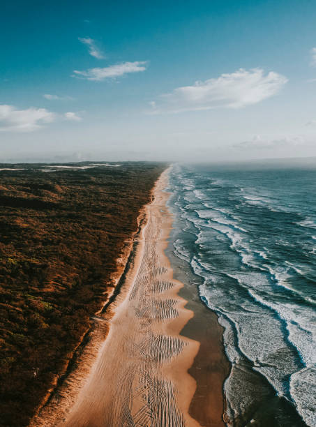 istock Drone view of a coastline under a blue sky 2158513246