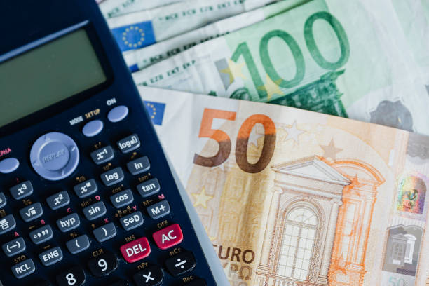 istock Calculator and Euro banknotes on a table 2158513706