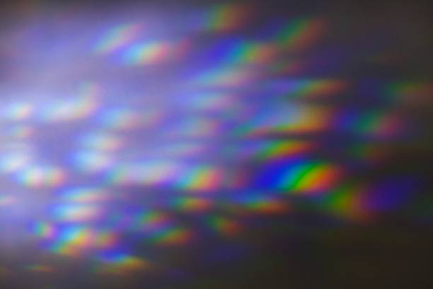 istock Iridescent rainbow blue prism light flare on black background 2158515311