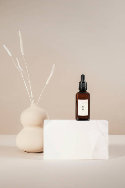 istock Brown glass dropper bottle with a white box product mockup 2158516504