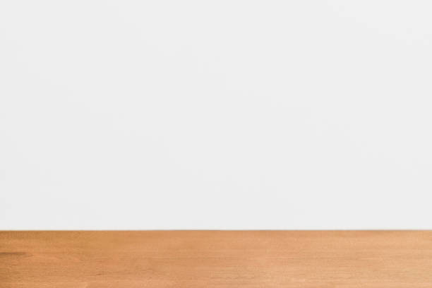 istock White wall with wooden floor background 2158517402