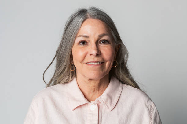 istock Happy senior woman in a studio shoot 2158518762