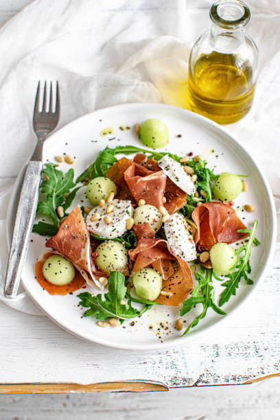 istock Colorful summer salad bowl with parma ham 2158519045