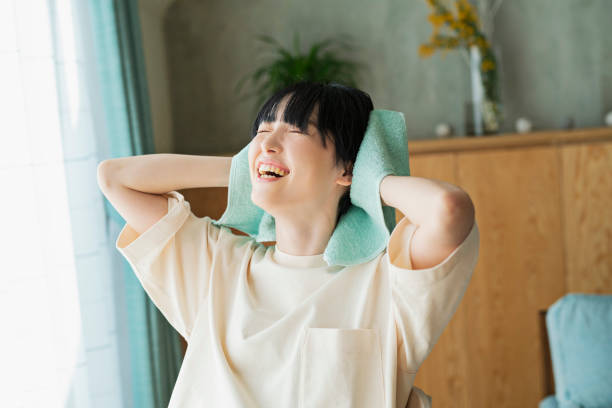 istock Women wiping their hair after bathing. 2158521441